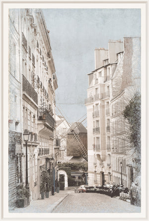 Paris Street View I wall art featuring a cobblestone street with historic buildings and a windmill.