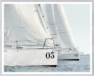 Racing Yachts wall art featuring two white sailboats with numbers 03 and 05 on the hulls.