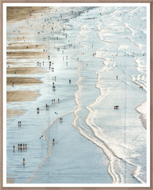 Playa de Zarautz wall art featuring a serene beach scene with people walking along the shore.