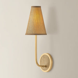 Buskirk Wall Sconce 5.5" in aged brass shown from the front to reveal the arm curve and shade silhouette.