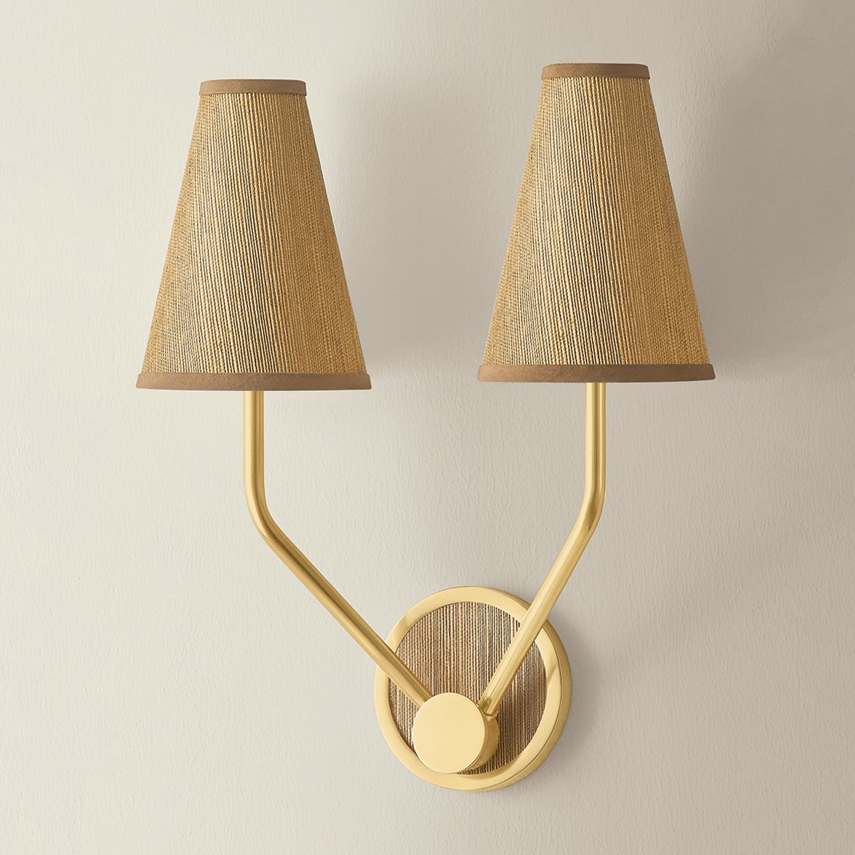 Buskirk Wall Sconce 15" in aged brass shown from a second angle to highlight the arm curve and shade silhouette.
