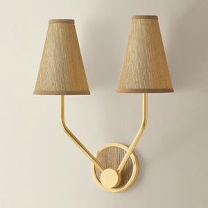 Buskirk Wall Sconce 15" in aged brass shown from a second angle to highlight the arm curve and shade silhouette.
