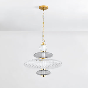 Williams Pendant 19" in aged brass shown from a second angle to highlight the shade shape and metal detail.