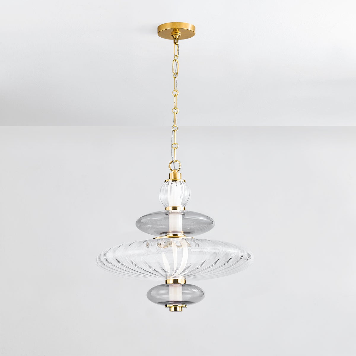 Williams Pendant 19" in aged brass shown from the front to reveal the shade shape and metal detail.