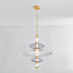 Close-up of the Williams Pendant 24.75" in aged brass showing the shade shape and metal detail.