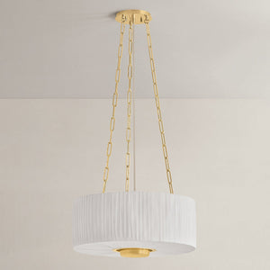 Camby Pendant in aged brass shown from the front to reveal the shade shape and metal detail.