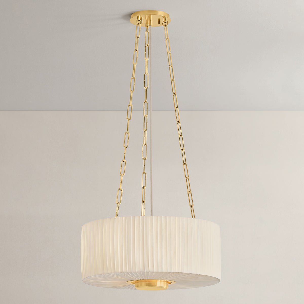 Close-up of the Camby Pendant in aged brass showing the shade shape and metal detail.