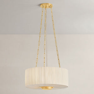Close-up of the Camby Pendant in aged brass showing the shade shape and metal detail.