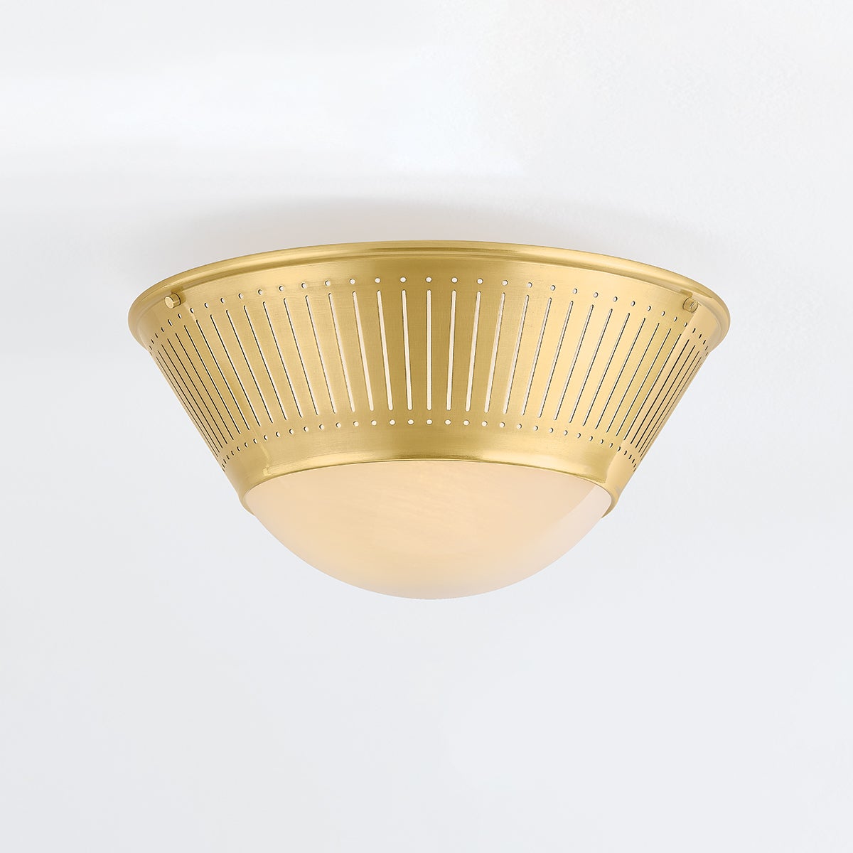 Elsmere Flush Mount in aged brass shown from the front to reveal the shade profile and mounting canopy.