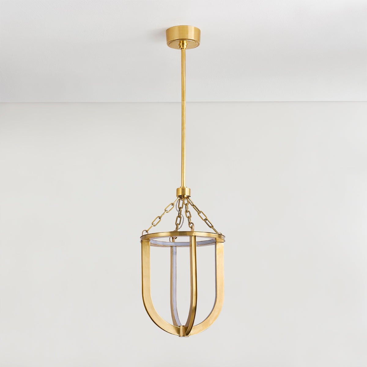 Tournu Lantern 11.5" in aged brass shown from a second angle to highlight the frame and glass panel detail.