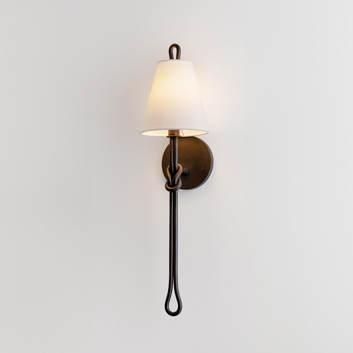 Close-up of the Alburgh Wall Sconce showing the arm curve and shade silhouette.