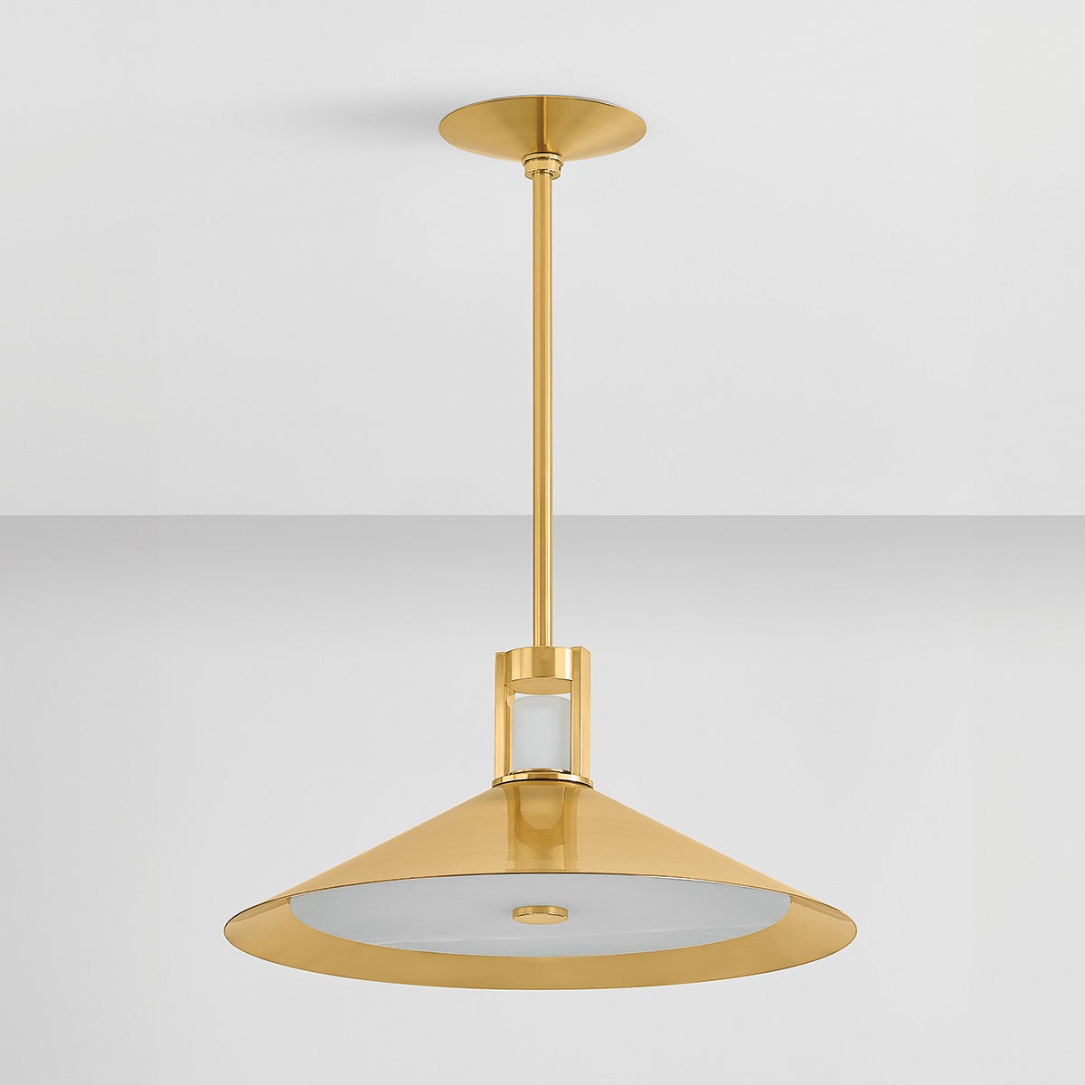 Clermont Pendant 20" in aged brass shown from the front to reveal the shade shape and metal detail.
