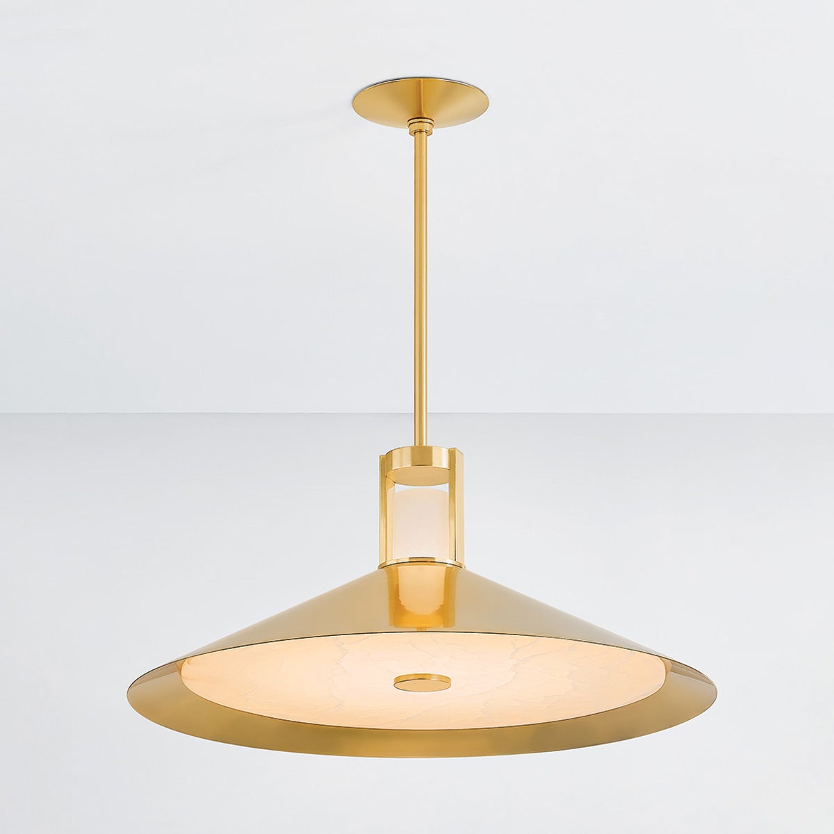 Close-up of the Clermont Pendant 28" in aged brass showing the shade shape and metal detail.