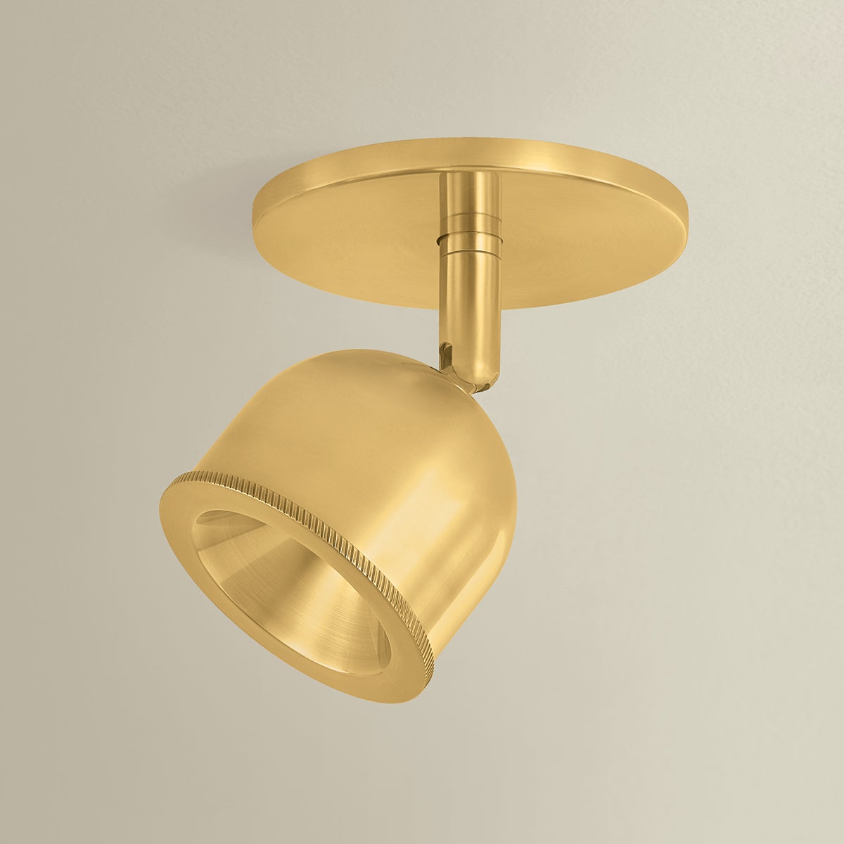Tuthill Flush Mount in aged brass shown from the front to reveal the shade profile and mounting canopy.