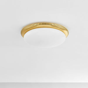 North Castle Flush Mount 14.25" in aged brass shown from a second angle to highlight the shade profile and mounting canopy.