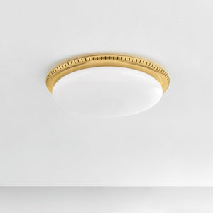 North Castle Flush Mount 18.25" in aged brass shown from a second angle to highlight the shade profile and mounting canopy.