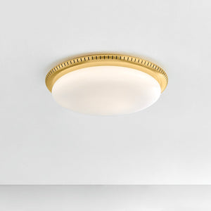 North Castle Flush Mount 18.25" in aged brass shown from the front to reveal the shade profile and mounting canopy.