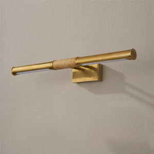 Hallstead Picture Light 24" in aged brass shown from a second angle to highlight the arm curve and shade proportion.