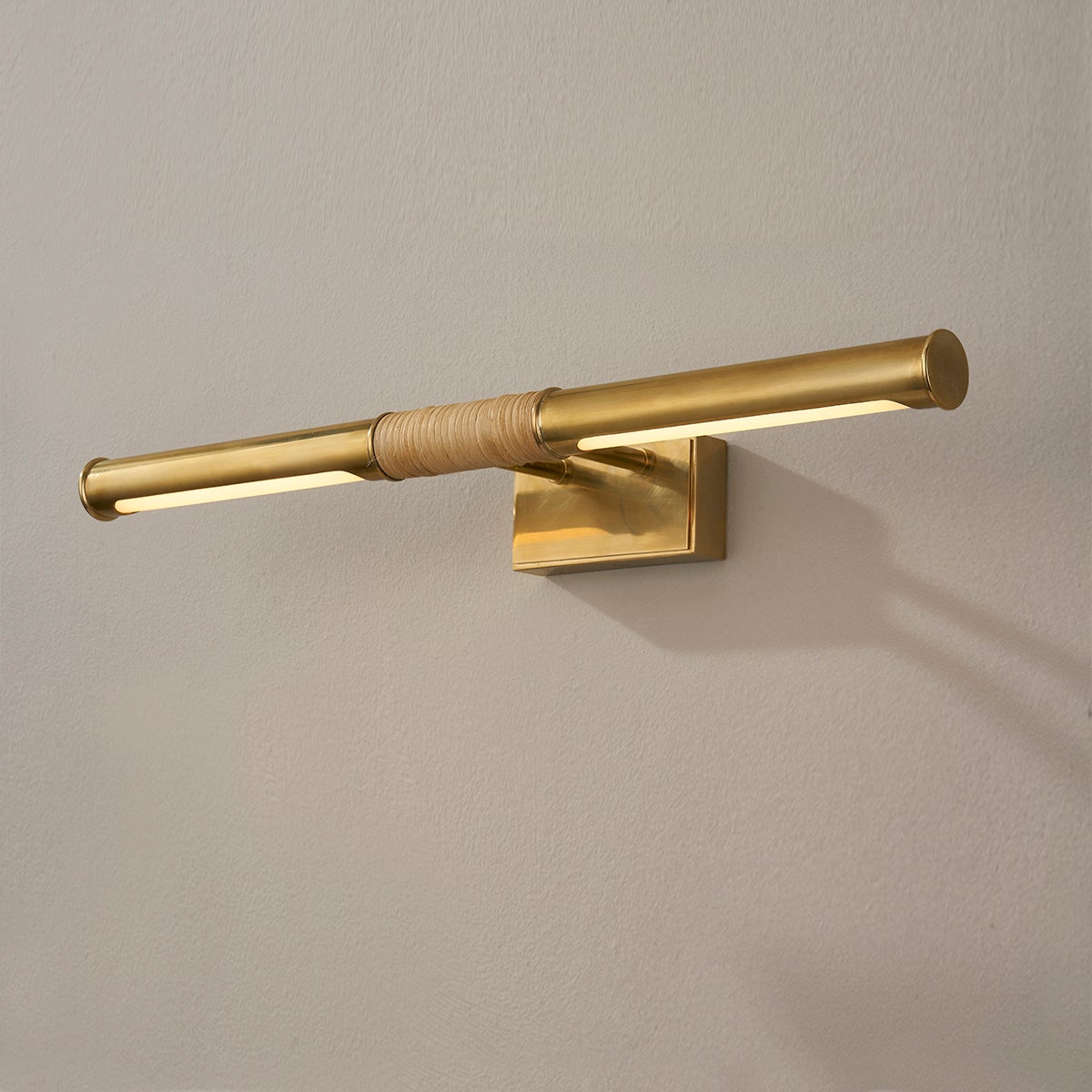 Hallstead Picture Light 24" in aged brass shown from the front to reveal the arm curve and shade proportion.