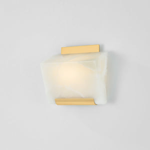 Close-up of the Fairfield Wall Sconce in aged brass showing the arm curve and shade silhouette.