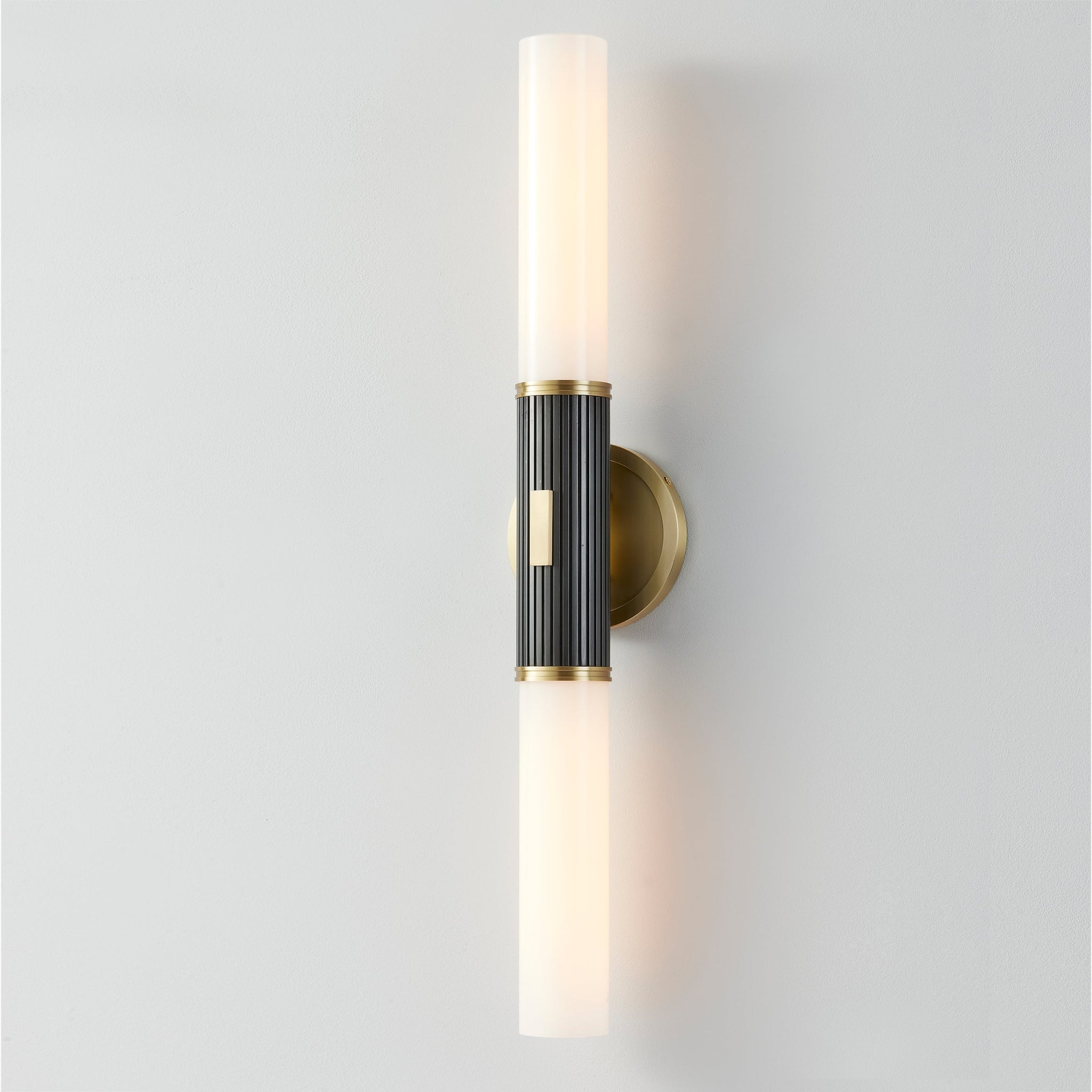 Close-up of the Crewe Wall Sconce 5" x 26.25" showing the arm curve and shade silhouette.