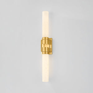 Close-up of the Glen Oaks Wall Sconce in aged brass showing the arm curve and shade silhouette.
