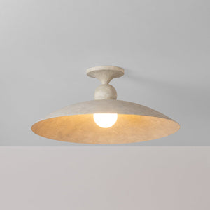 Teelin Flush Mount shown from the front to reveal the shade profile and mounting canopy.