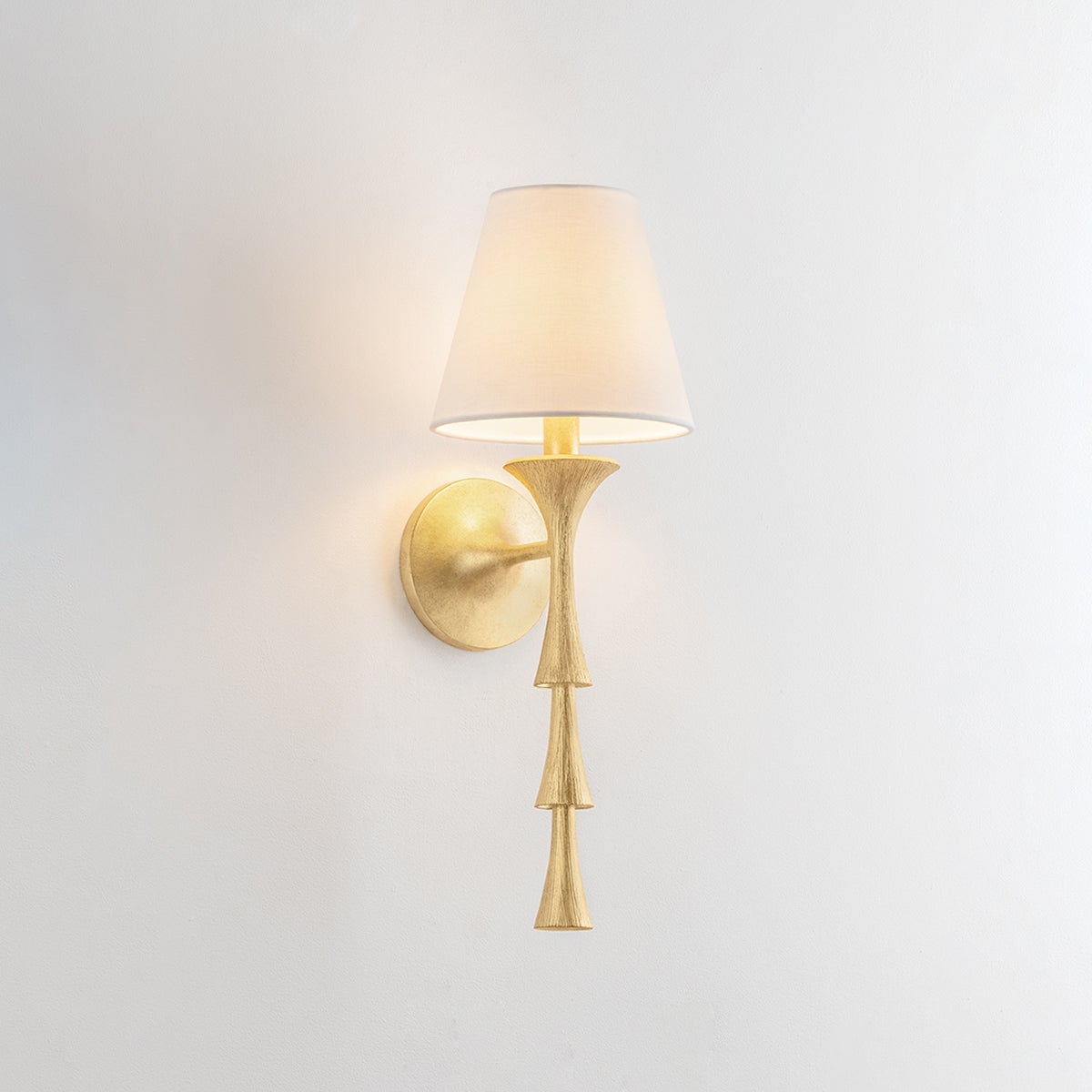 Vails Gate Wall Sconce shown from the front to reveal the arm curve and shade silhouette.
