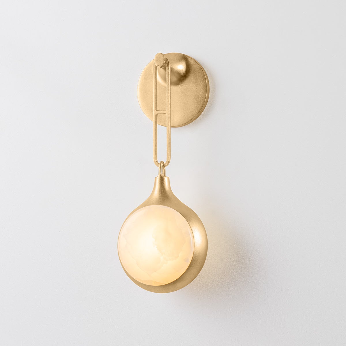 Riviere Wall Sconce shown from the front to reveal the arm curve and shade silhouette.