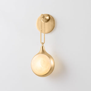 Riviere Wall Sconce shown from the front to reveal the arm curve and shade silhouette.