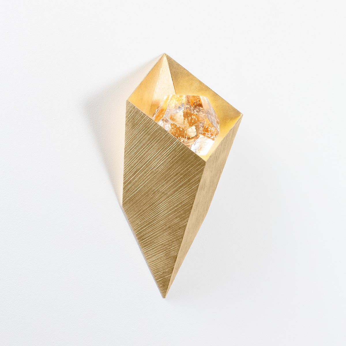 Close-up of the Conch Wall Sconce showing the arm curve and shade silhouette.