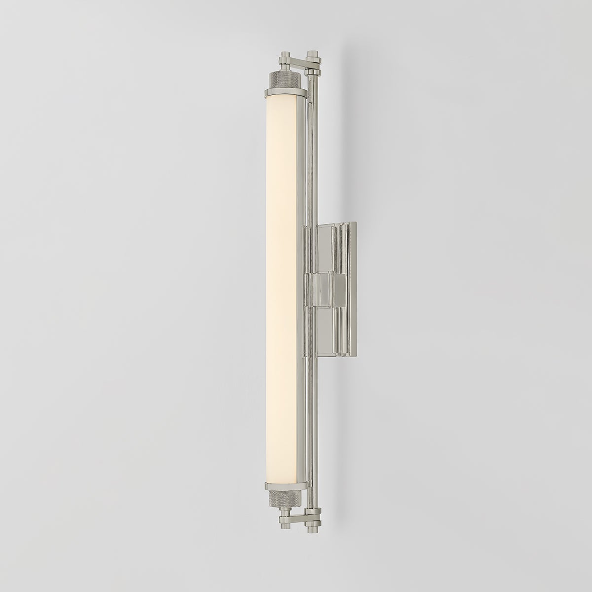 Close-up of the Plandome Bath And Vanity 4.25" x 28" in polished nickel showing the arm spread and shade silhouette.