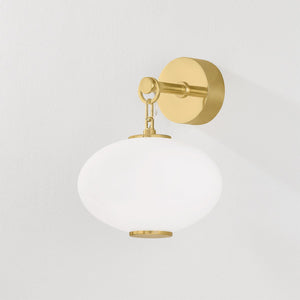 Nephele Wall Sconce shown from the front to reveal the arm curve and shade silhouette.