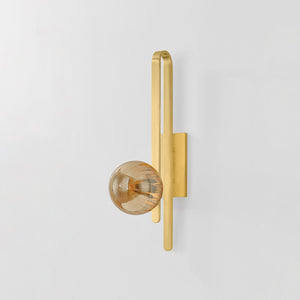 Cronus Wall Sconce shown from a second angle to highlight the arm curve and shade silhouette.