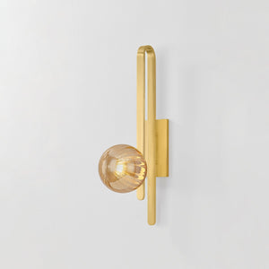 Close-up of the Cronus Wall Sconce showing the arm curve and shade silhouette.