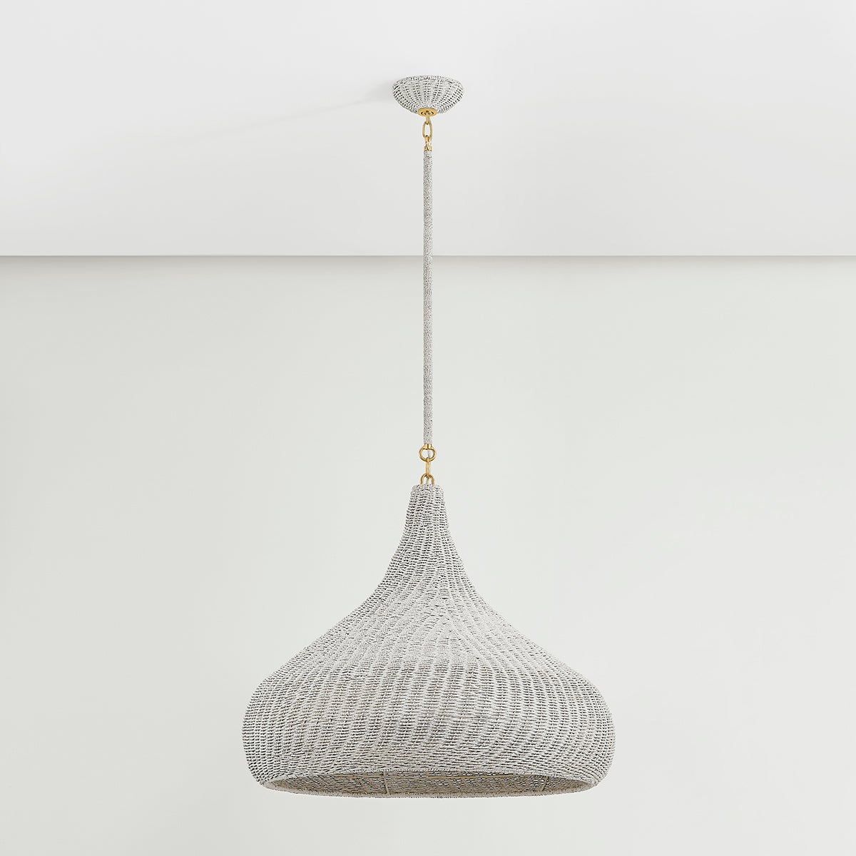 Hampstead Pendant 28" in aged brass shown from the front to reveal the shade shape and metal detail.