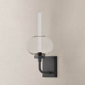 Close-up of the Rossman Wall Sconce in dark bronze showing the arm curve and shade silhouette.