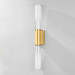 Colrain Wall Sconce 5.25" x 31.75" in aged brass shown from the front to reveal the arm curve and shade silhouette.