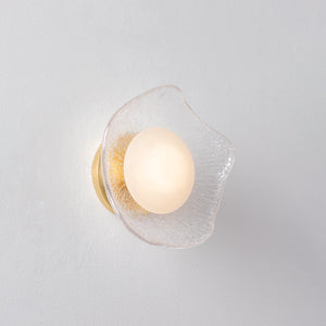 Almandine Wall Sconce shown from the front to reveal the arm curve and shade silhouette.