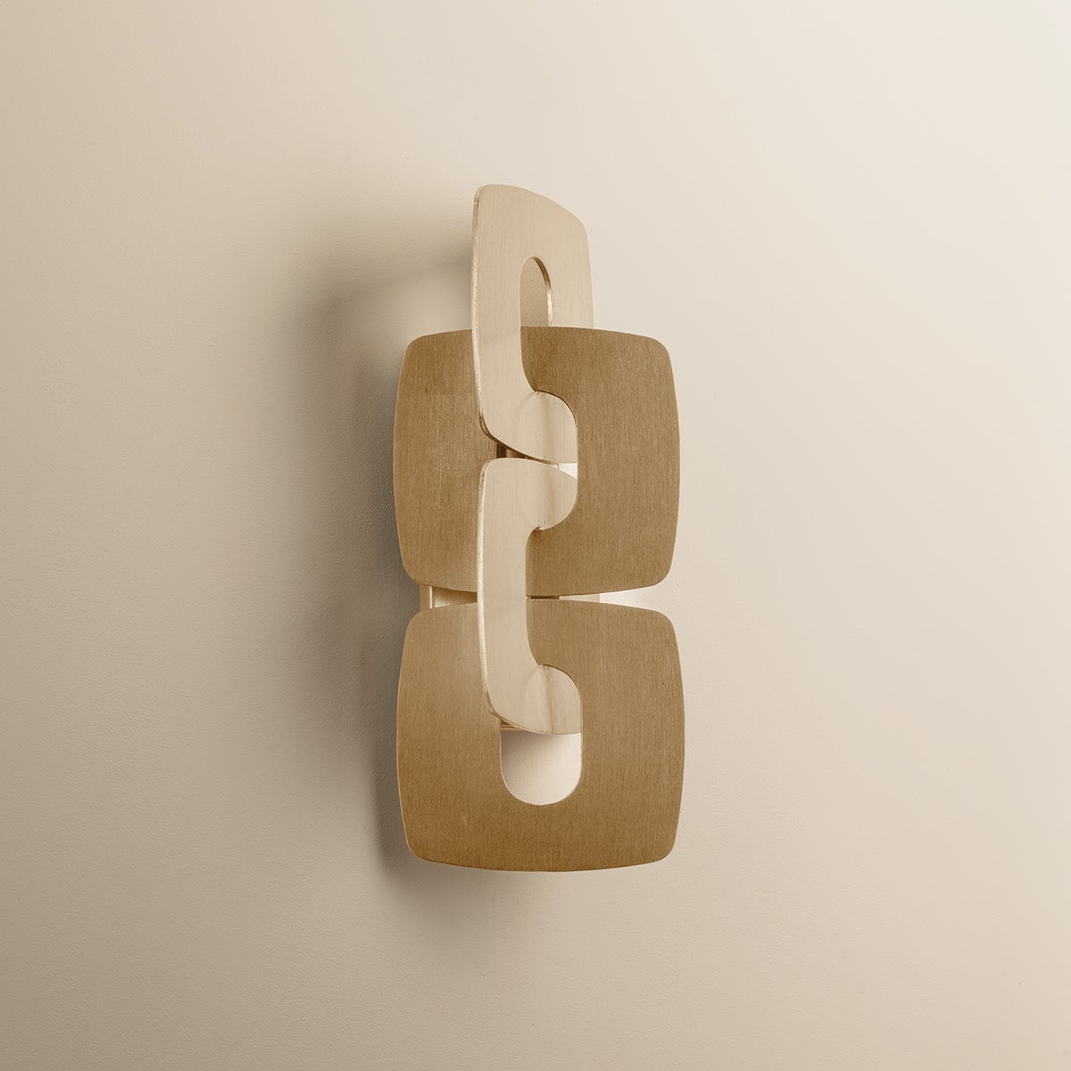 Close-up of the Trentino Wall Sconce showing the arm curve and shade silhouette.