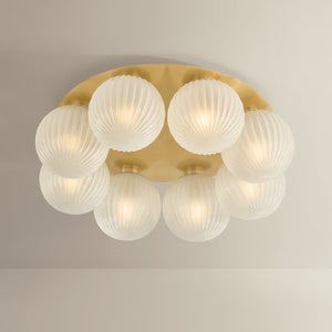 Vernazza Flush Mount 23.5" shown from the front to reveal the shade profile and mounting canopy.