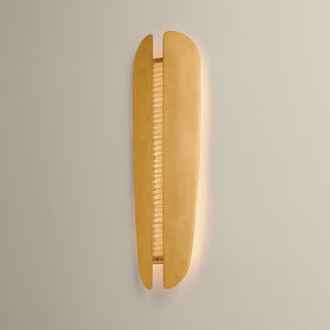 Lille Wall Sconce shown from a second angle to highlight the arm curve and shade silhouette.