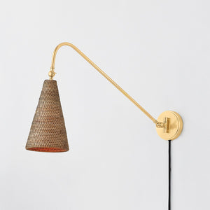 Close-up of the Averack Plug-In Sconce in aged brass showing the arm profile and shade silhouette.