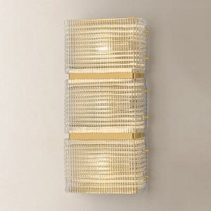 Mav Wall Sconce 8.5" x 16.75" shown from the front to reveal the arm curve and shade silhouette.