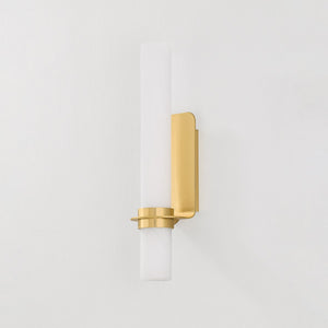 Groveland Station Wall Sconce 4.75" x 18" in aged brass shown from a second angle to highlight the arm curve and shade silhouette.