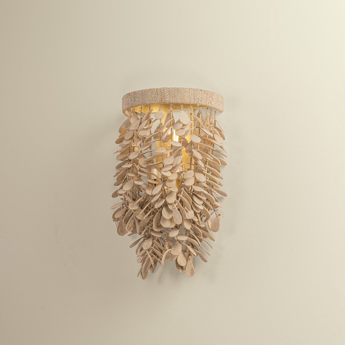 Naxos Wall Sconce shown from the front to reveal the arm curve and shade silhouette.