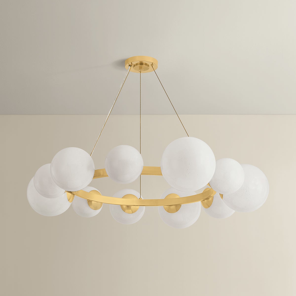 Pacama Chandelier 40.25" in aged brass shown from the front to reveal the frame, arms, and shade detail.