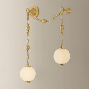 Corda Wall Sconce shown from a second angle to highlight the arm curve and shade silhouette.