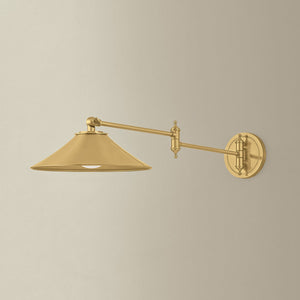 Lithgow Wall Sconce in aged brass shown from a second angle to highlight the arm curve and shade silhouette.