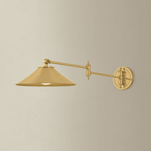 Lithgow Wall Sconce in aged brass shown from the front to reveal the arm curve and shade silhouette.